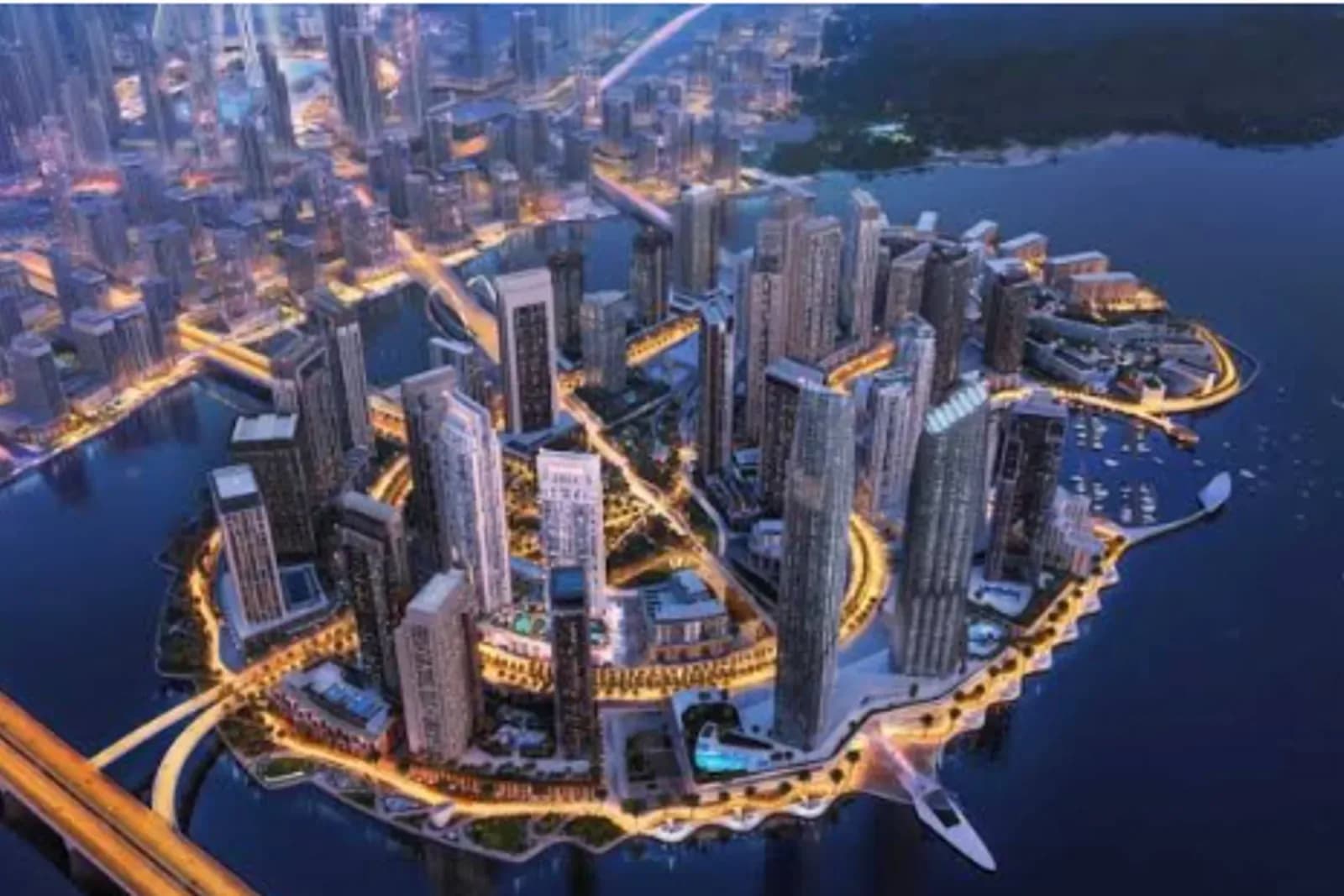 Aerial night view of Dubai Creek Harbour's waterfront island district